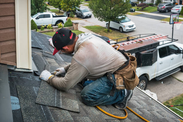 Professional Storm Damage Roof Repair technician working in Chincoteague Island, VA
